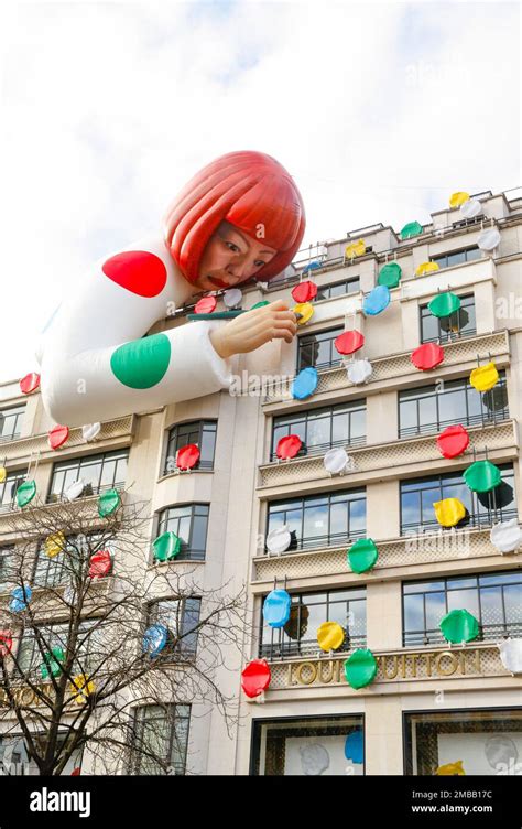 Yayoi Kusama Sculpture Peers Over Louis Vuitton's Champs